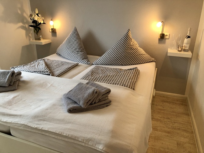 Ferienwohnung in Scharbeutz - Strandk&ouml;rbchen - Schlafzimmer mit Meerblick aus dem Bett