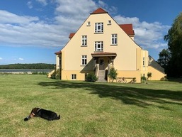 Ferienwohnung 1 direkt am Wasser im Gut Grubnow R&uuml;gen