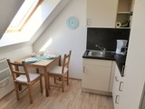 Ferienwohnung in Gollwitz - Spatzennest - Essecke mit K&uuml;chenzeile
